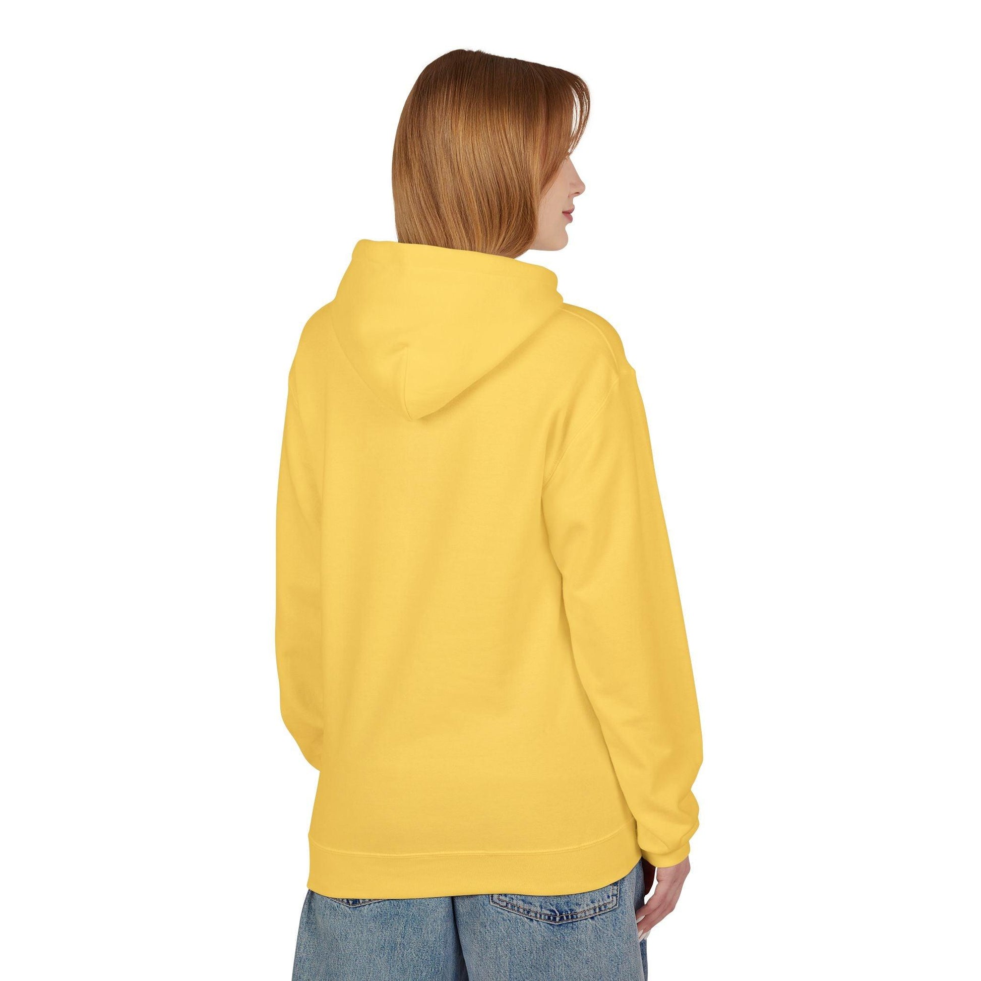back of woman wearing yellow surfer hoodie